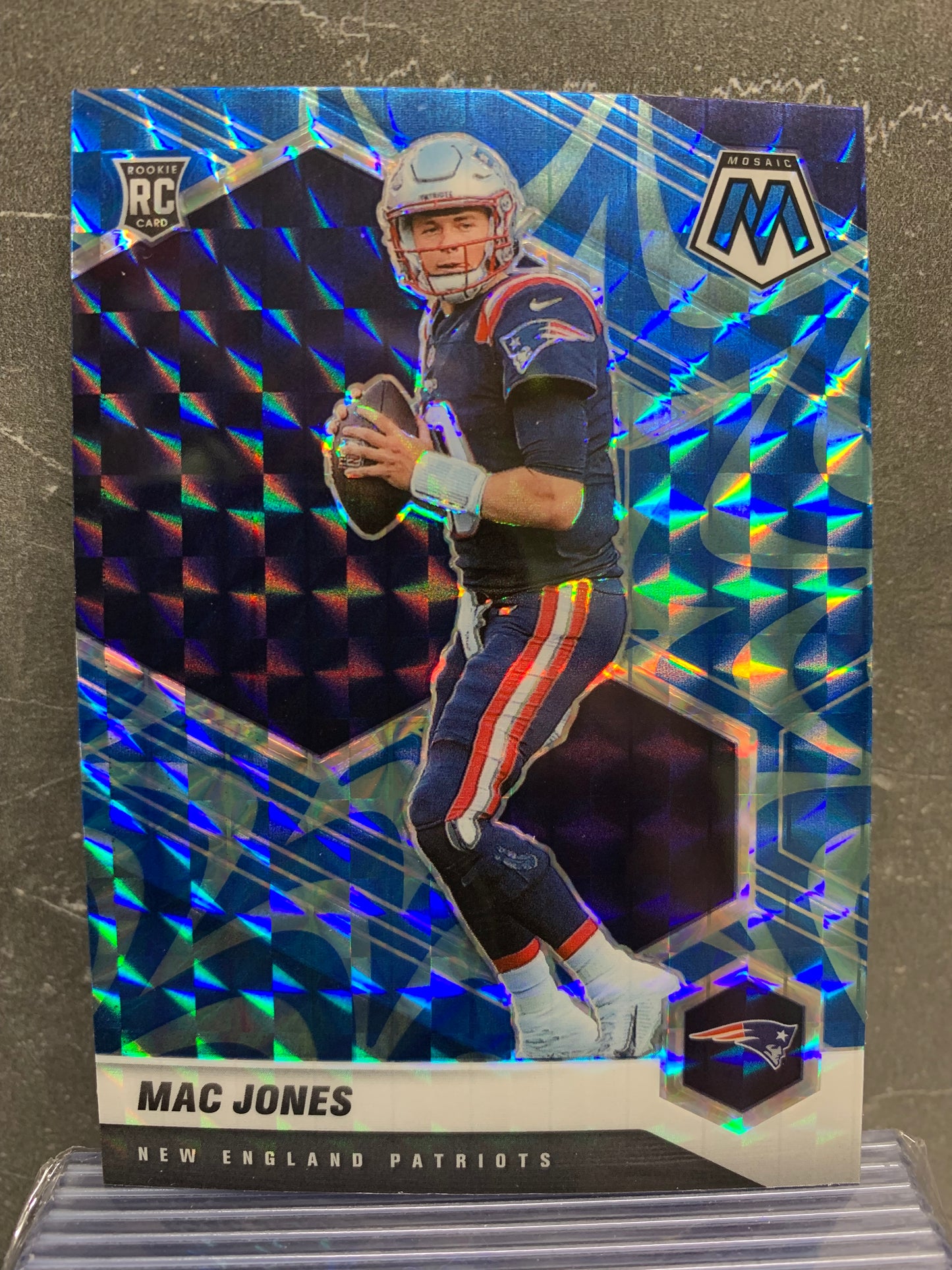 2021 Panini Mosaic Mosaic Reactive Blue #306 Mac Jones RC New England Patriots